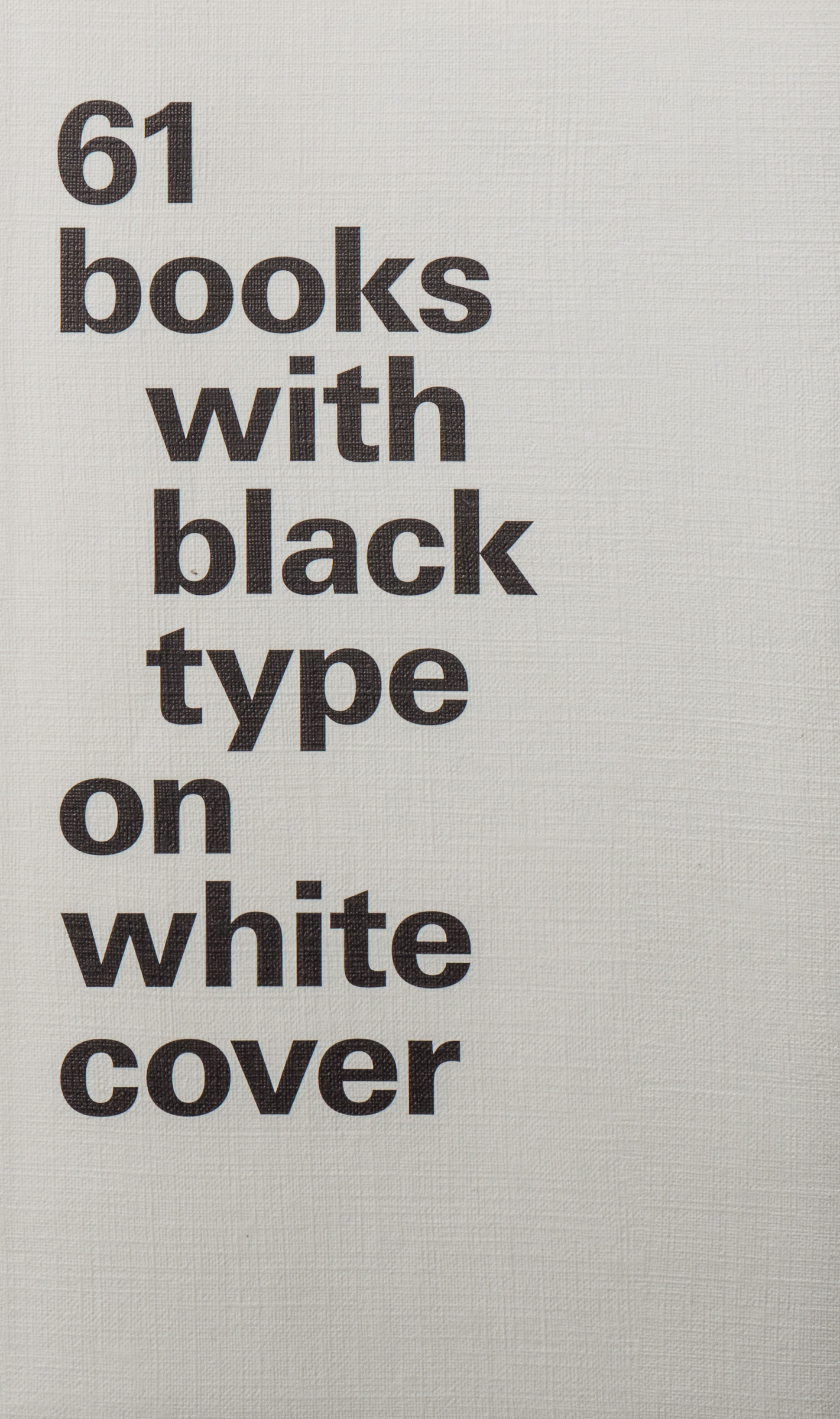 61 books with black type on white cover — Buchhandlung Lia Wolf
